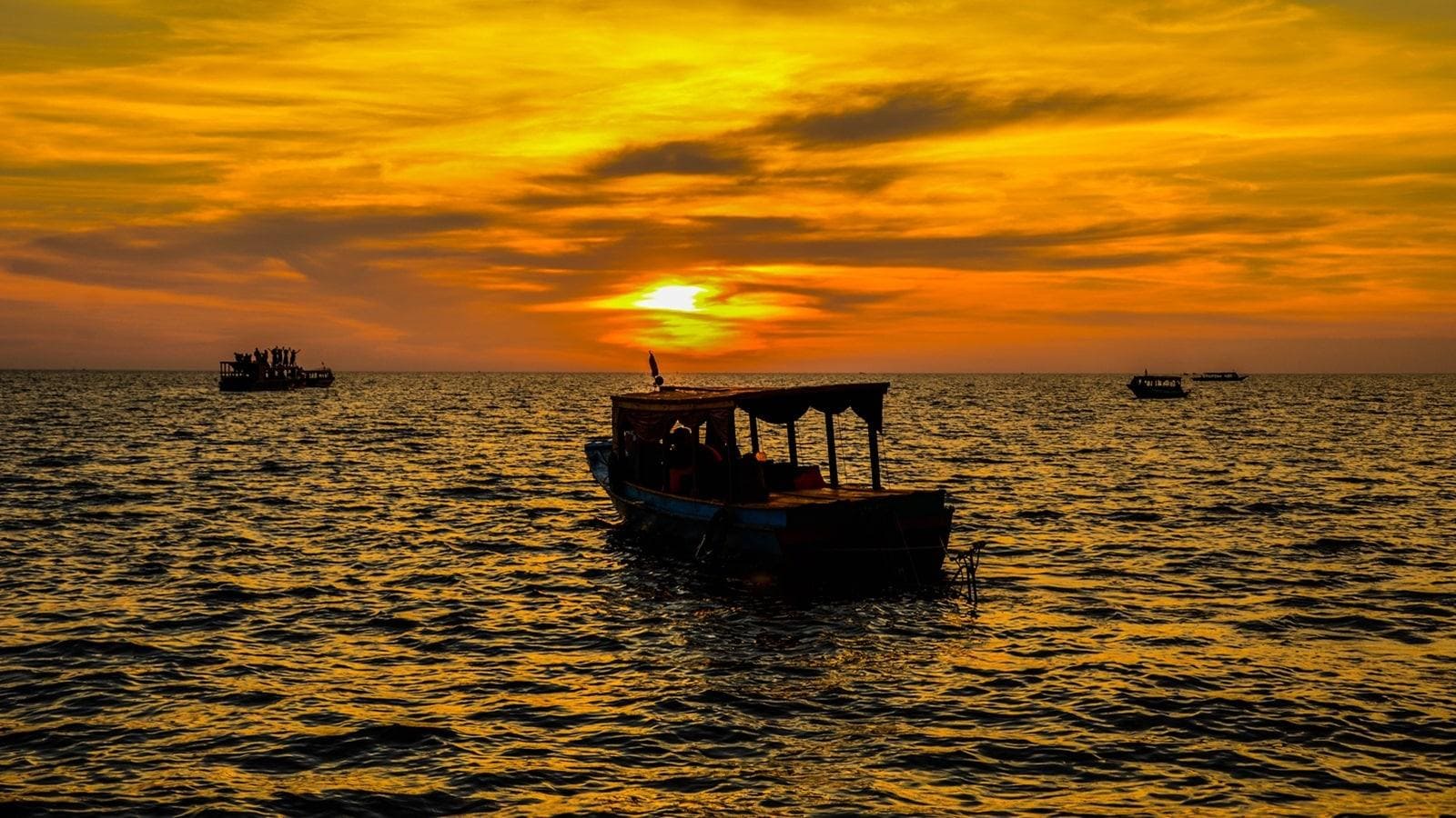 Saveurs Khmeres, Bénédiction Bouddhiste et Coucher de Soleil sur le Tonlé Sap photo 3